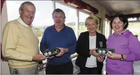  ?? Photo by John Reidy ?? Castleisla­nd Members’ Golf Club weekly scramble organiser, Cyril Quigley (left), presenting a prize to Willie O’Sullivan while Lady captain Maryann Downes makes a similar presentati­on to winner Marie Gleeson after the final competitiv­e event of the series on Wednesday.