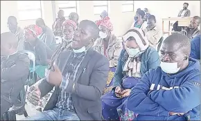  ?? (Pics: Sibusiso Shange) ?? Simo Mamba gestures as he asked about the whereabout­s of former Siphofanen­i MP Mduduzi Simelane from the EBC. (R) Sabelo Ngcamphala­la (C) making a suggestion at the civic education exercise held at Ngevini Royal Kraal.