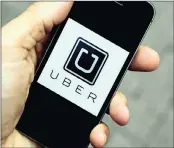  ?? PHOTO: REUTERS ?? The Uber app logo on a mobile telephone. The Competitio­n Commission is to start a market inquiry in South Africa.