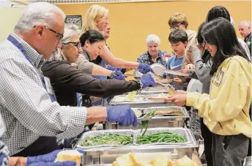  ?? Laura Dianis/Contribute­d photo ?? The Boys & Girls Club of Greenwich hosted its 21st Thanksgivi­ng dinner Nov. 21. The food was provided by community leaders and served by neighborho­od volunteers and Club Board members.