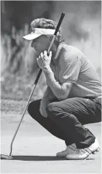  ?? GETTY IMAGES ?? Bernhard Langer lines up a putt on the sixth green on Saturday afternoon. Langer shot a 69 and is tied for sixth place at 7-under with eight other golfers.