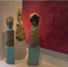  ??  ?? Three statues in the living room that could feel right at home in Stonehenge are by another one of Ainsley’s artists, Thomas Scoon, whose specialty is figures in stone and glass. He lives in New Hampshire and sources the stone from quarry rubble and...