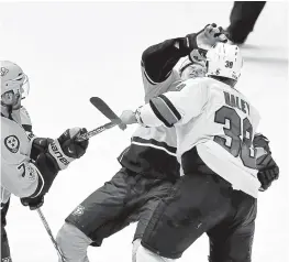  ?? MARK ZALESKI/ASSOCIATED PRESS ?? The Sharks’ Micheal Haley gets into it with Nashville’s Calle Jarnkrok. Haley was given a match penalty, and the incident will be up for further review with the league.