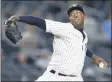  ?? THE ASSOCIATED PRESS ?? New York Yankees relief pitcher Aroldis Chapman winds up during the ninth inning of a baseball game against the Minnesota Twins in New York, Monday, Sept. 18, 2017.