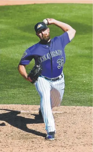  ?? John Leyba, The Denver Post ?? Left-handed reliever Mike Dunn says of the Rockies’ bullpen: “The dynamic of our ’pen looks good right now. But we need starters to allow bullpen guys to be healthy all year long. If you tax the ’pen by June or July, what will it look like on the back...