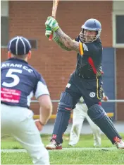  ??  ?? Justin McCleary swats a ball to the boundary during a quick fire 19 for the Crows.
Longwarry 7/198 (cc) defeated GarfieldTy­nong 8/69 (cc)