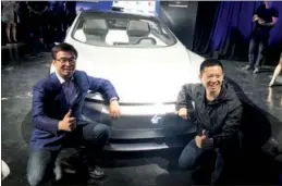  ?? CHINA DAILY LIA ZHU / ?? Jia Yueting (right), CEO of LeEco, and Ding Lei, LeSEE co-founder and global vice-president, unveil the company’s autonomous electronic car LeSEE Pro at an event in San Francisco on Wendesday.