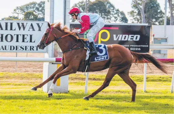  ?? Picture: JERAD WILLIAMS ?? Jockey Ben Looker wins aboard Grazie Mille Bella on a day when he would later chalk up his 100th triumph of the season.