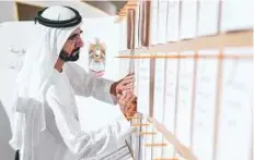  ?? WAM ?? Shaikh Mohammad Bin Rashid pens a message.