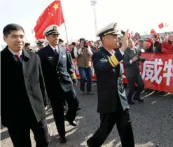  ??  ?? Chinese officers from the 24th Chinese navy are welcomed upon their arrival.