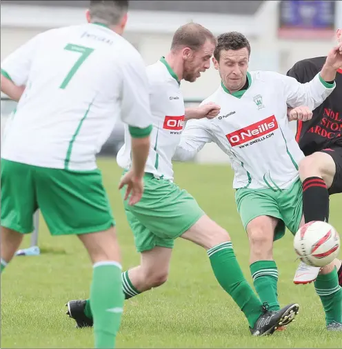  ??  ?? Gary Nugent in the thick of the action for Duleek against Bridge Rovers on Sunday afternoon.