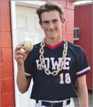  ?? Submitted Photo ?? Howe’s Ky Lynn shows his game-winning home run ball after the Lions’ victory against Heavener on Friday.