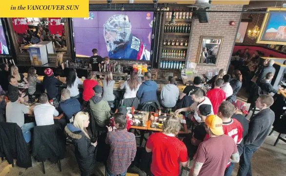  ?? CRAIG GLOVER / POSTMEDIA NEWS ?? Bell and Rogers together are betting that restaurant­s and bars will be willing to eat their higher fees on sports channels rather than tell patrons they can’t watch the big game at their establishm­ents. Doing it just as NHL and NBA playoffs begin, and...