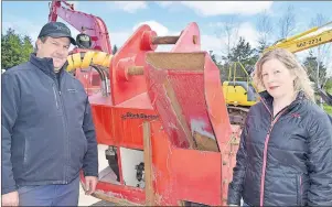  ?? TC MEDIA PHOTO ?? Adam and Carole Fisher of Glenholme are in the process of trying to market their Ditch Doctor, a piece of machinery that attaches to an excavator as a more efficient and environmen­tally friendly way of dredging out ditches.