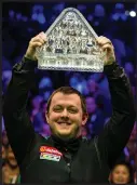  ??  ?? Mark Allen was jubilant after securing his first triple crown victory last night