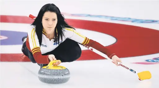  ?? JEFF MCINTOSH THE CANADIAN PRESS ?? Team Canada skip Kerri Einarson makes a shot against Team Alberta during the semifinal draw at the Scotties Tournament of Hearts in Calgary on Sunday. The tournament ended too late for this edition, visit therecord.com for full results.