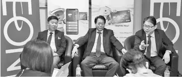  ?? — Bernama photo ?? Kenji (right) during media interview on Aeon Group – The Future of Brick-and-Mortar: How Aeon is Enhancing yesterday. Also present are Washizawa (middle) and Aeon Big (M) Sdn Bhd managing director Masayoshi Masuda (left).