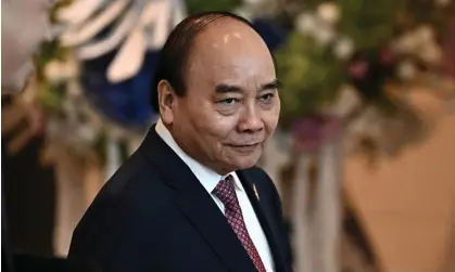  ?? ?? The sudden departure of Vietnam’s president, Nguyen Xuan Phuc, is a highly unusual move in the communist country. Photograph: Reuters