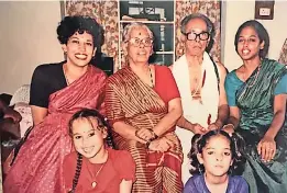  ??  ?? A young Kamala Harris seen here (back left) in a family photo wearing a sari. Credit: Courtesy of Sharada Balachandr­an Orihuela