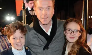  ??  ?? Blessed: Damian Lewis with his children Gulliver and Manon