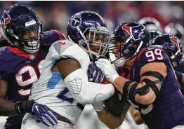  ?? Brett Coomer / Staff photograph­er ?? J.J. Watt (99) knows what it’s like playing against the Titans and now the franchise has been in contact after his release from the Texans.