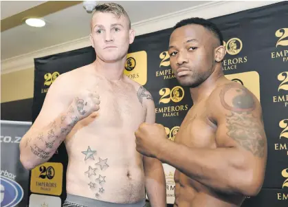  ?? Picture: Gallo Images ?? READY TO RUMBLE. Thabiso Mchunu (right) and Tommy Oosthuizen face off during the weigh-in for their Repeat or Revenge fight yesterday which takes place at Emperors Palace tonight.