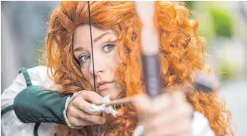  ?? FOTO: DPA ?? Sina Voss , verkleidet als Merida aus dem Disney-Film „Brave“ist seit 14 Jahren Cosplay-Anhängerin.