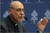  ?? GREGORIO BORGIA — THE ASSOCIATED PRESS ?? The prefect of the Vatican's Dicastery for the Doctrine of the Faith, Cardinal Victor Manuel Fernandez, presents the declaratio­n `Dignitas Infinita' (Infinite Dignity) during a press conference at the Vatican on Monday.