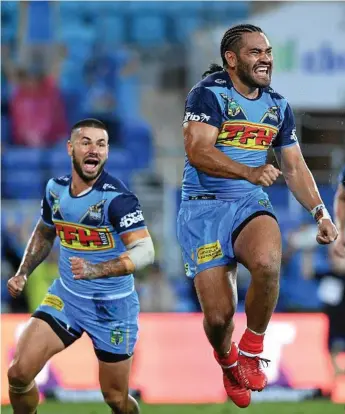  ?? Photo: DAVE HUNT ?? IT’S GAME TIME: Konrad Hurrell (right) and Nathan Peats will be key components for the Gold Coast Titans in their huge game against the Dragons tomorrow.