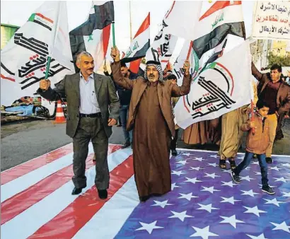  ?? ALAA AL-MARJANI / REUTERS ?? Protesta contra els atacs nord-americans a la ciutat de Najaf, a l’Iraq
