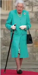  ?? ?? Staying mobile: The Queen with her walking stick