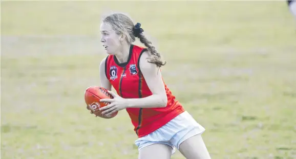  ??  ?? FIJI BOUND: Anthea Moodie (pictured in action for South Toowoomba Bombers Aussie rules Club) is heading to Fiji as part of the NRL Pacific Outreach program. Picture: Nev Madsen