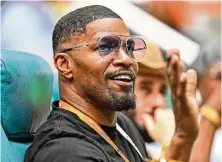  ?? CHANDAN KHANNA / AFP / GETTY IMAGES / TNS ?? Jamie Foxx attends a match at the 2023 Miami Open, in Miami Gardens, Fla., on March
30. He has been accused of assaulting a woman at a New York bar.