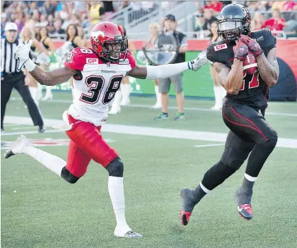  ?? WAYNE CUDDINGTON/ FILES ?? The pull of family caused running back Jeremiah Johnson, right, to leave the Redblacks as a free agent and sign with B.C.