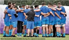  ??  ?? New Zealand’s players huddle during the captain’s run session
