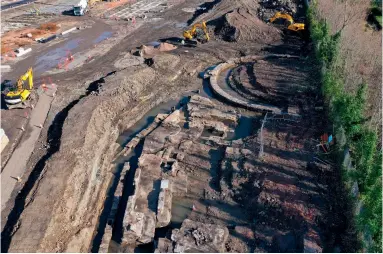  ??  ?? Fig. 3: View of the excavated remains showing eastern bastion on the sea wall and the curved end of the east dry dock (image by Dennis Swanson)