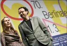  ??  ?? The directors of the Berlinale film festival, Mariette Rissenbeek and Carlo Chatrian, present the program of the Berlinale in Berlin on Wednesday.