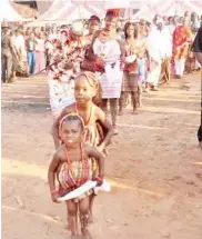  ??  ?? Another village cultural dancers with kids perform at the arena