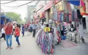  ?? RAVI CHOUDHARY/HT PHOTO ?? Street vendors set up stalls at Central Market in Lajpat Nagar, one of Delhi’s prominent shopping destinatio­ns.