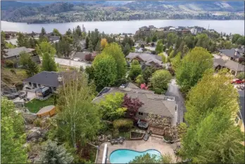  ?? ?? Contribute­d
An aerial view of Heritage Hills south of Penticton is shown in this photo attached to a real estate listing for an existing home in the community. Building permits are no longer being issued for new homes there due to issues with the privately owned sewer system.