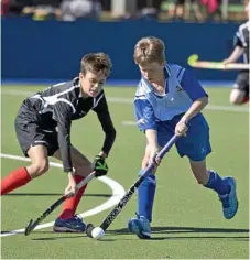  ??  ?? Thomas Davis takes control during the Under-13 Boys Queensland Hockey State Championsh­ips at Clyde Park.