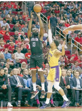  ?? — USA Today Sports ?? Houston Rockets guard James Harden (13) shoots the ball over Los Angeles Lakers guard Josh Hart (3) during the second quarter at Toyota Center.