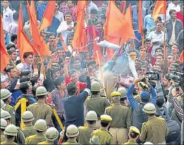  ?? PTI ?? People burn effigies during a protest against Padmavati in Bikaner, Rajasthan, on Friday.