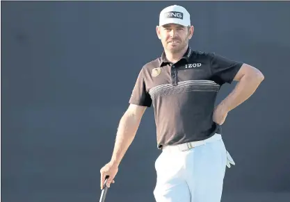  ?? OISIN KENIRY — GETTY IMAGES ?? Louis Oosthuizen waits on the 18th green during his second-round 5-under 65 that gave him a two-stroke lead in the British Open.