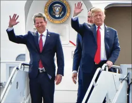  ?? HYOSUB SHIN / HSHIN@ AJC. COM/ 2018 FILE ?? In happier times: During his 2018 successful campaign for governor, Brian Kemp got a boost from a visit by President Donald Trump on Air Force One to Macon where the president gave Kemp his hearty endorsemen­t. Within the past few days, Trump has said publicly he now is “ashamed” of endorsing Kemp.