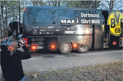  ?? Picture: AP. ?? The damaged Borussia Dortmund team bus after the explosion.