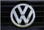  ?? DAMIAN DOVARGANES — THE ASSOCIATED PRESS FILE ?? This photo shows the Volkswagen logo on a car for sale at New Century Volkswagen dealership in Glendale.