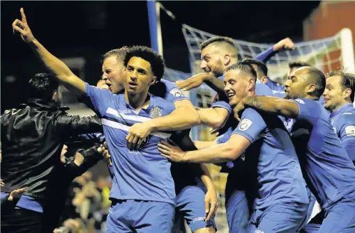  ?? Www.mphotograp­hic.co.uk ?? ●●Lewis Montrose celebrates his goal against Telford