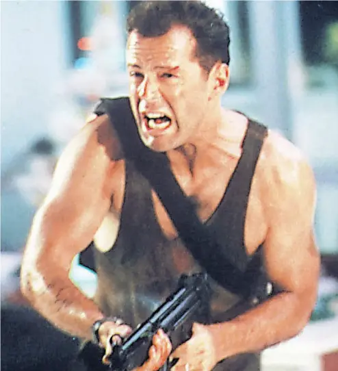  ?? PHOTOS: 20TH CENTURY FOX FILES ?? Bruce Willis stars as John McClane in 1988’s Die Hard. His task: topple a ring of German terrorists on Christmas Eve.