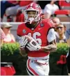  ?? CURTIS COMPTON/CURTIS.COMPTON@AJC.COM ?? Wide receiver Demetris Robertson made four catches for 88 yards and a TD.